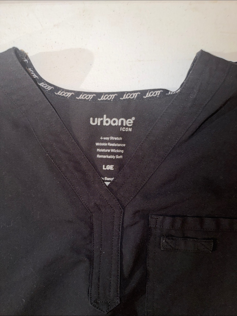 Urbane Black Short-Sleeve V-Neck scrub top with Chest Pocket